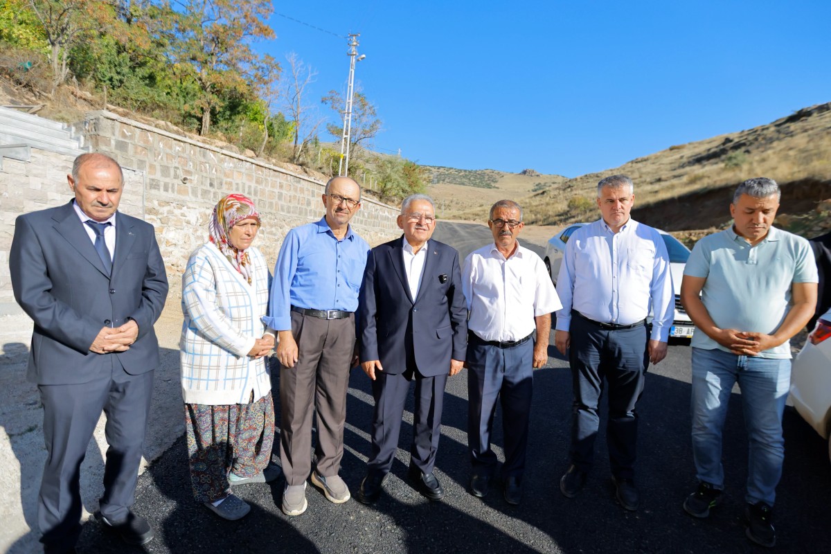 DEVELİ TOMBAK MAHALLESİ ASFALTA KAVUŞTU 